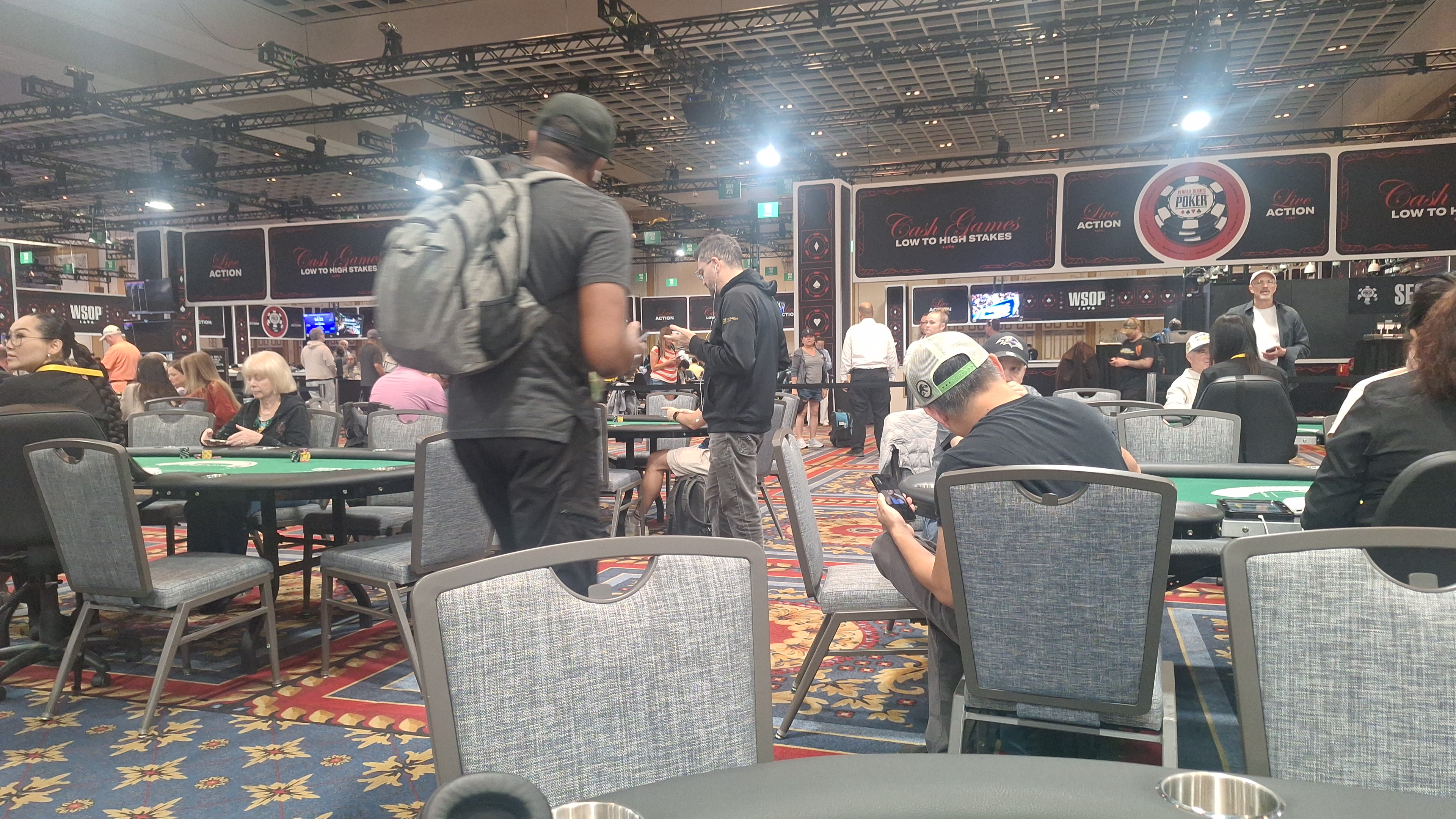 Inside the WSOP poker room with players at the tables